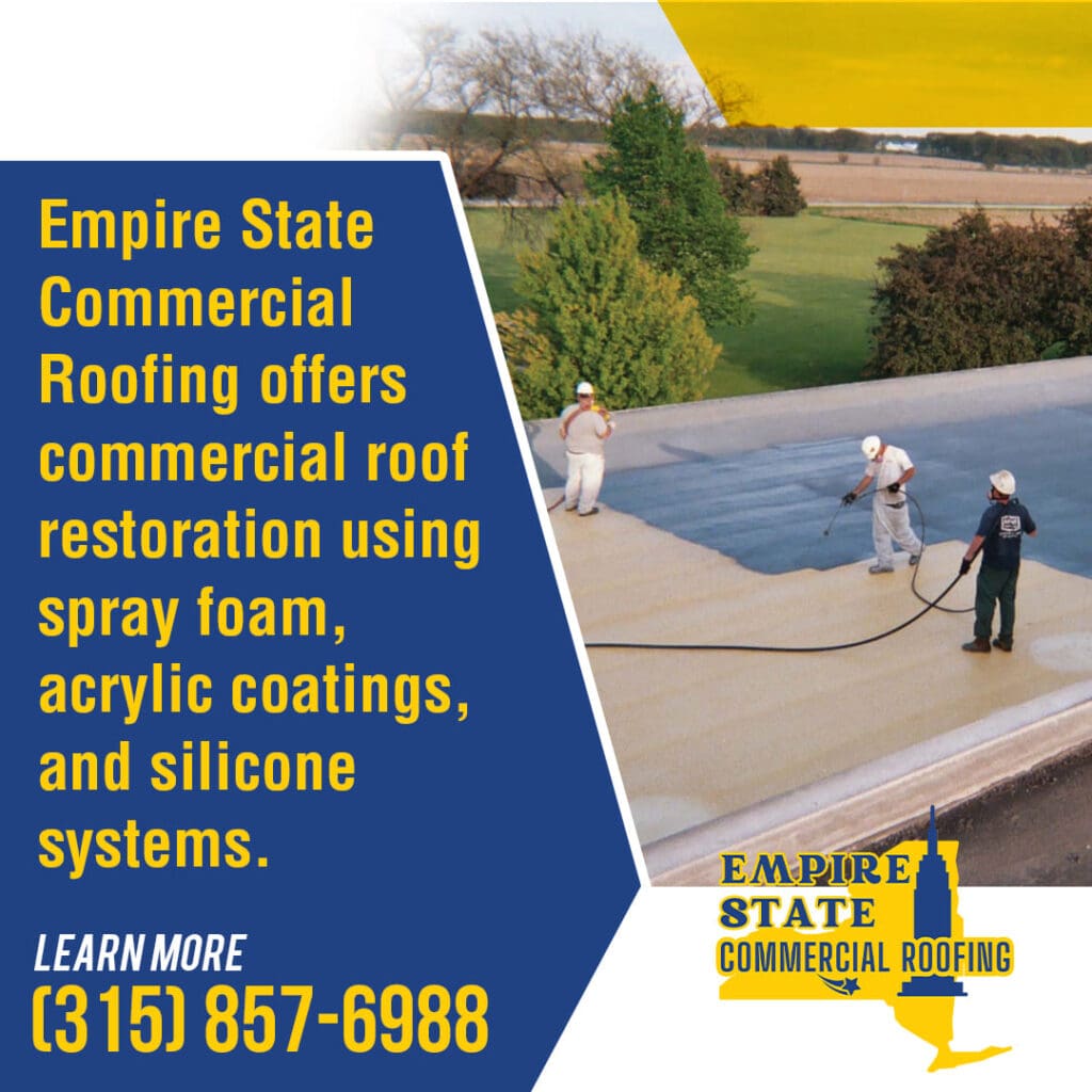 Three workers applying spray foam or coating to a large commercial roof, demonstrating Empire State Commercial Roofing's restoration services.