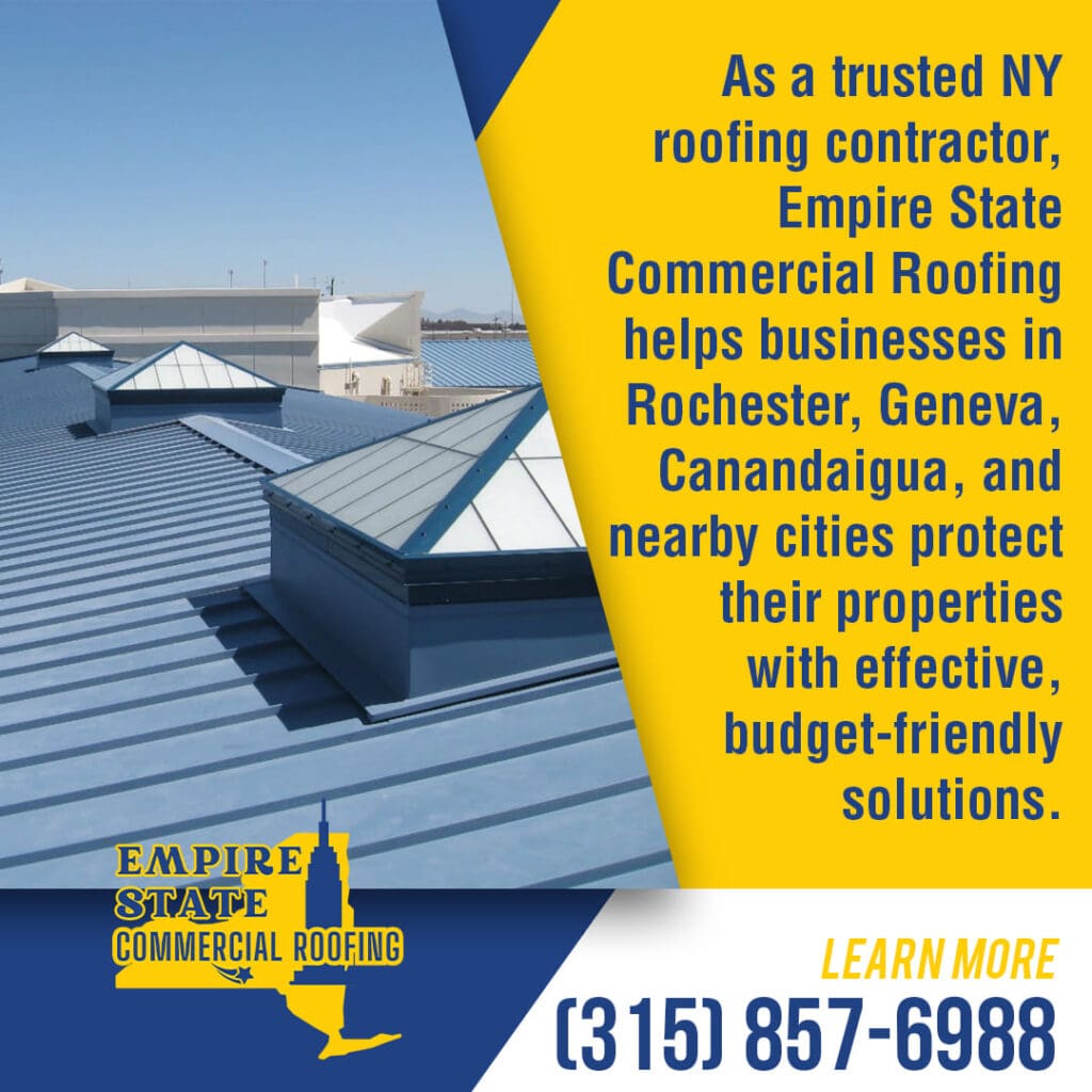 Blue commercial metal roof with multiple skylights and vents, showcasing Empire State Commercial Roofing's services in Rochester, Geneva, Canandaigua, and nearby NY cities.